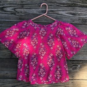 Woman’s flowery blouse, size extra small